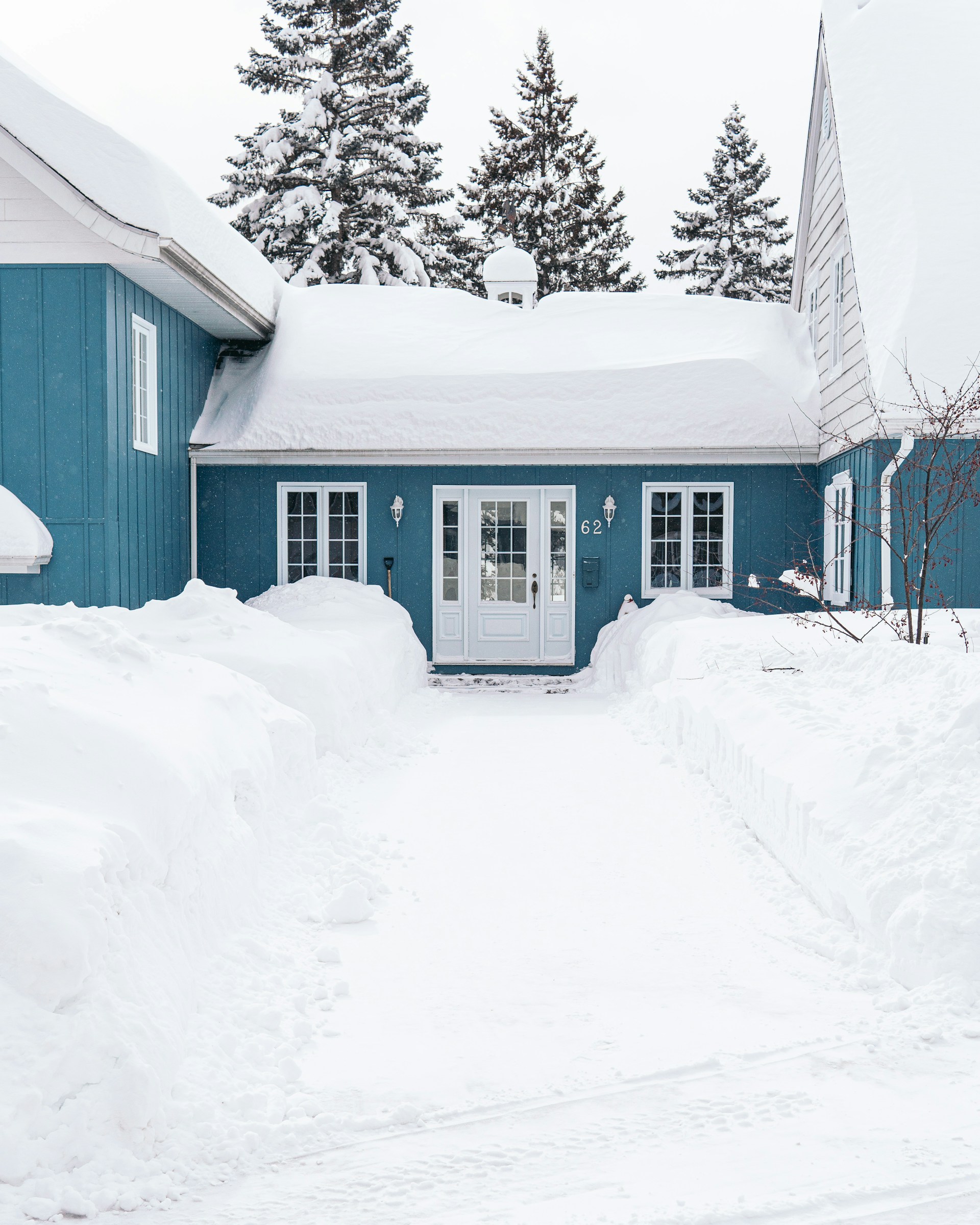 house buried in deep snow